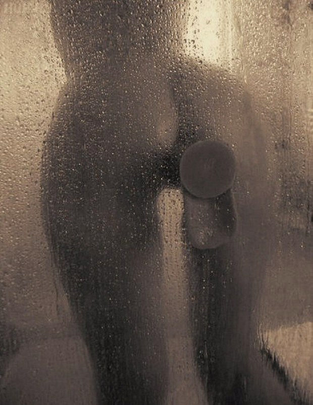 Cock sprayed with shower head image