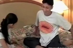 A cute asian handling cock