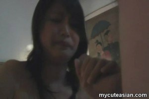 Young Asian has her first blowjob.