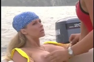 Busty babes in boat action