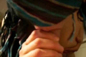 Blindfolded naked babe gags cock