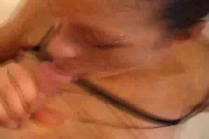 Pierced brunette sucking