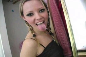 Young and blonde Callista undressing