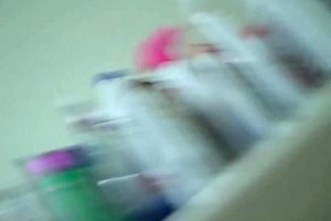 Curly brunette babe toying anus