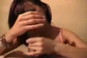 Naughty brunette jacks her guy off for fun