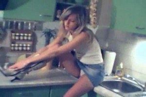 Innocent skinny teen naked in kitchen