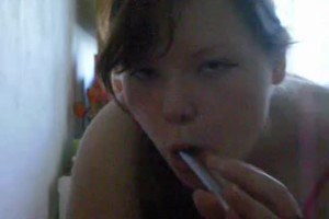 Hot teen girl puts dildo in ass