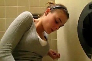 Hot teen girl masturbates in public bathroom