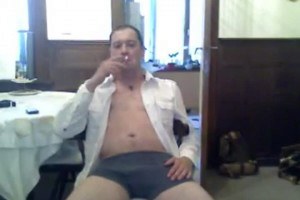 Guy in his underwear smoking