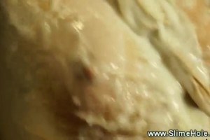 Pretty blonde babe nailed while drenched in gooey