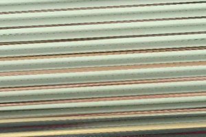 Vicious teen with large juggs gagging a stiff rod