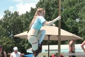 A sexy amateur stripping in public