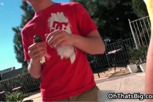 A cute twink wanking on a large cock