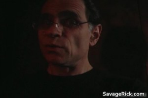 Busty redhead showing off her tits while getting ready for BDSM fun