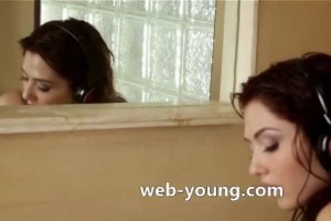 Yummy chick has her toy deep while listening to her music