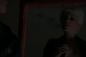 Wild blonde paying with a strapon toy