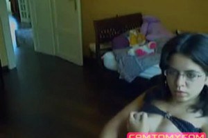 Lovely brunette with glasses rubbing pussy on cam