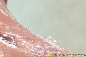 Horny gay twinks kissing under the shower