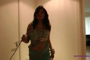 Busty Indian MILF rubs pussy with a stick