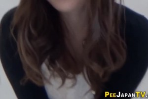 Asian pees through her panties