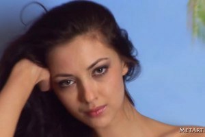 Busty brunette touching herself