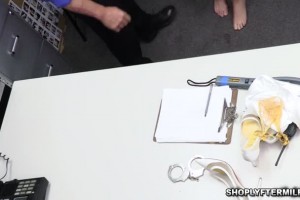 Redhead Kessie gets caught red handed so she bends over for the cop