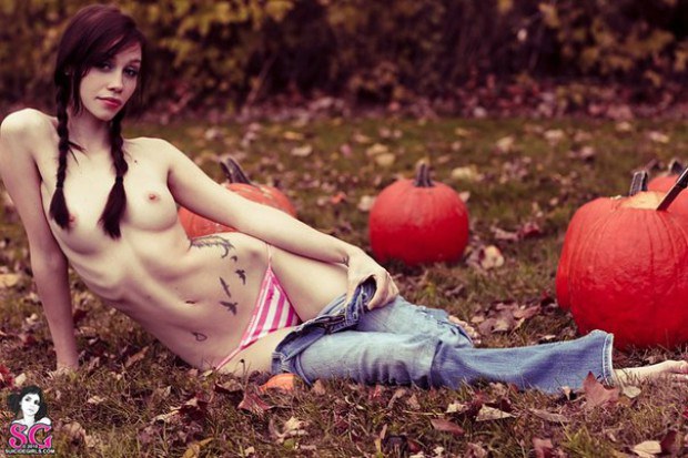 Skinny babe is topless in the field