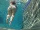Chubby amateur shows her booty while swimming 