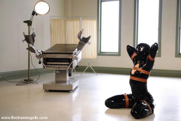 Latex suit sub waiting for maledom to humiliate her