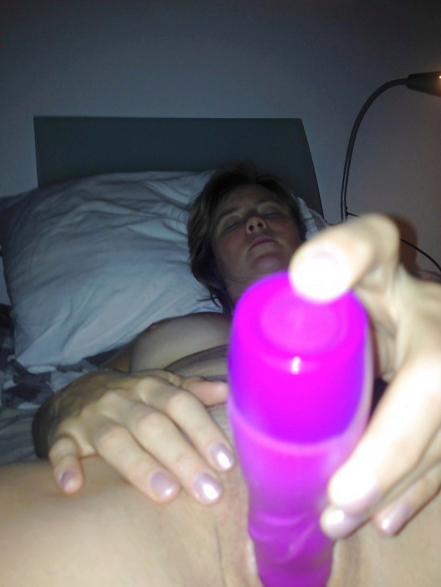 Amateur wife toys her snatch with vibrator