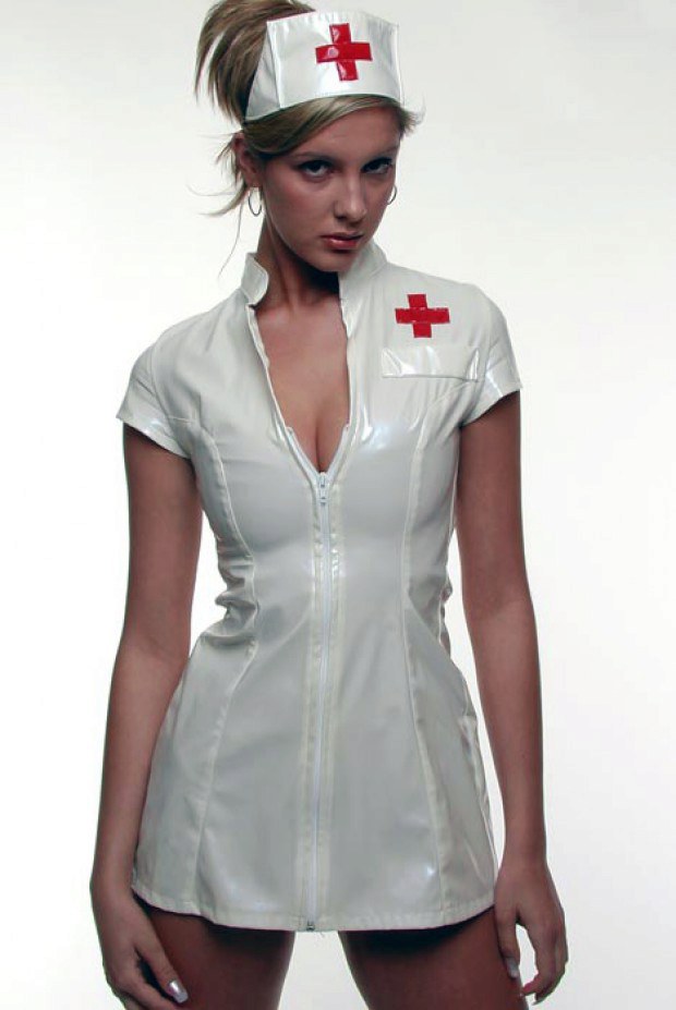 Hot blonde nurse in uniform has a sexy cleavage