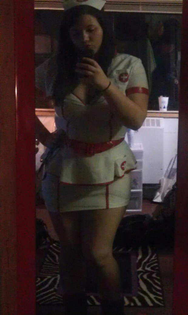 Curvy nurse amateur takes a selfie in the mirror