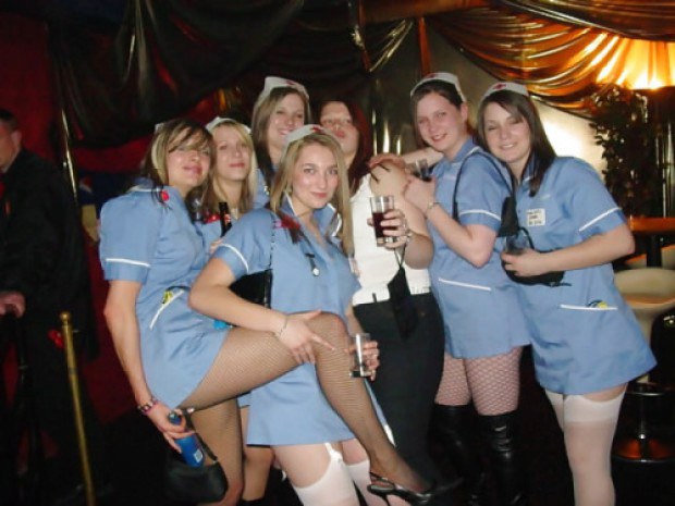 Amateur nurses showing off their sexy legs and kinky uniforms