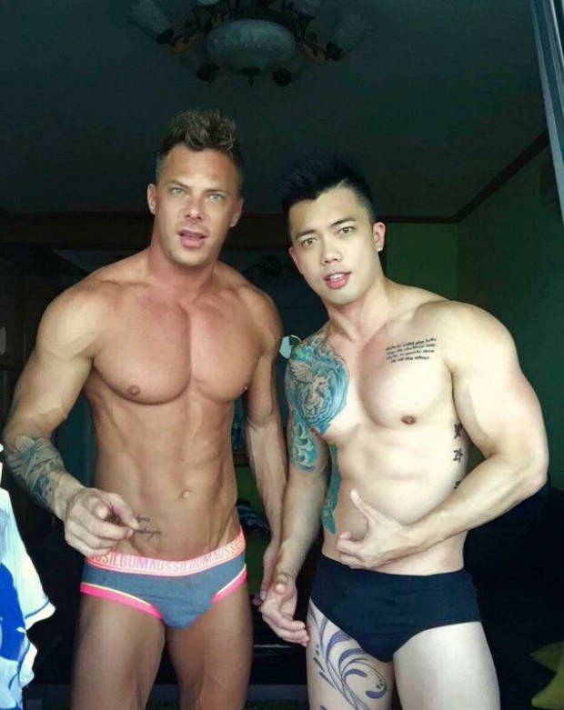 Muscular gay studs showing off their pecks