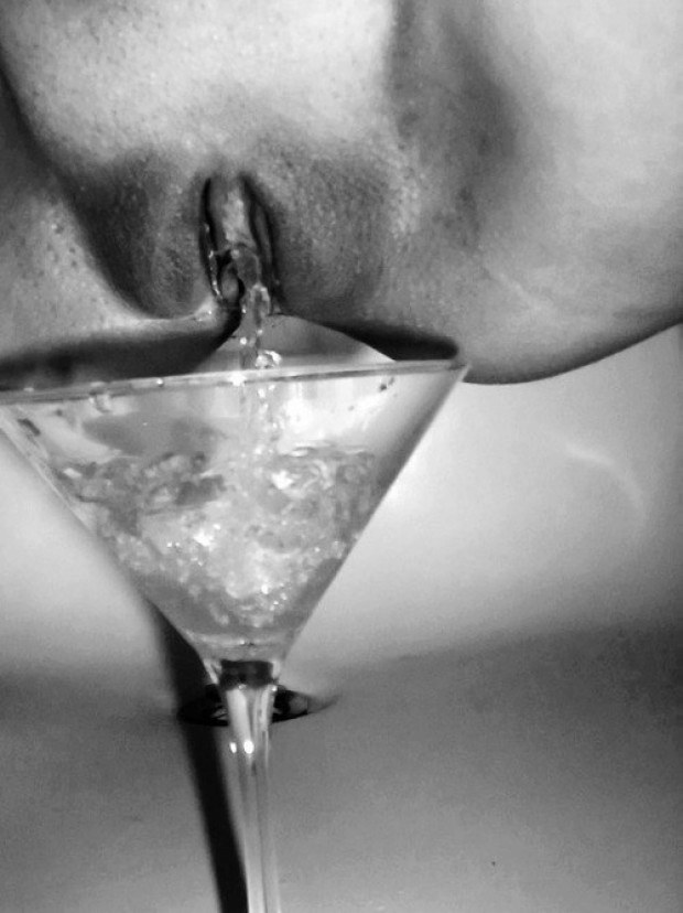 Kinky chick pees inside a martini glass