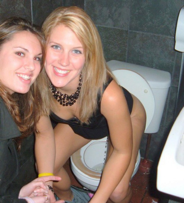 Friend watches as blonde pees in the restroom