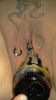 Pierced wife shoves a soda can inside her vagina 