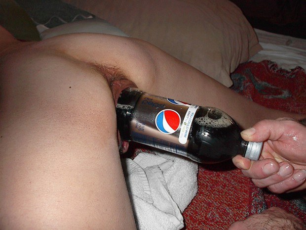 Wife takes a pepsi bottle inside her vag