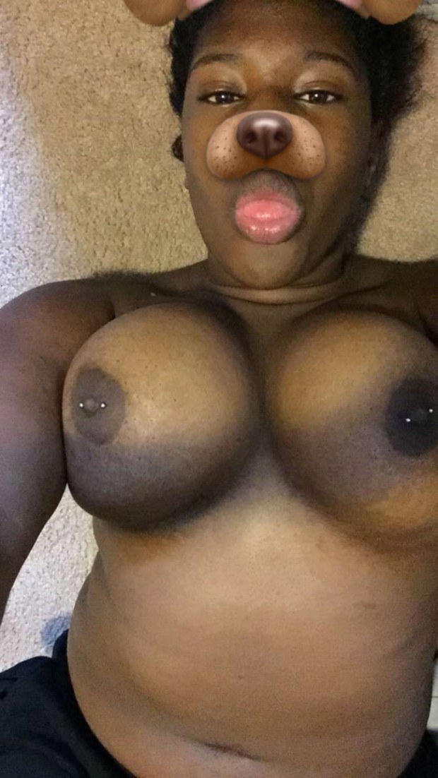 Ebony chick shows her boobies on webcam