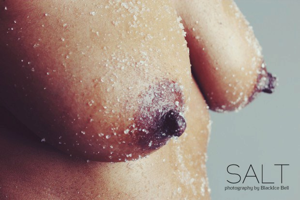 Ebony model gets her boobies covered in salt