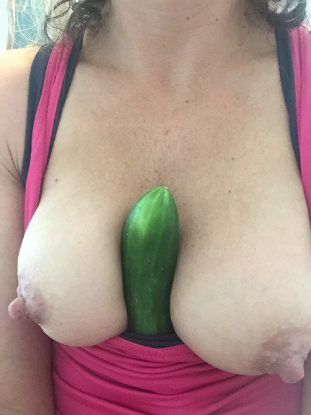 Amateur MILF takes a cucumber between her melons