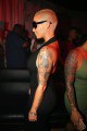 Inked blonde Amber Rose at a party