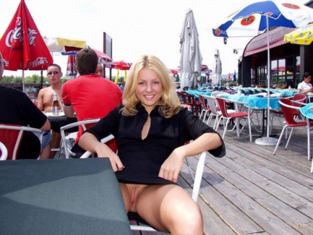 Tempestuous blonde shows upskirt at the table