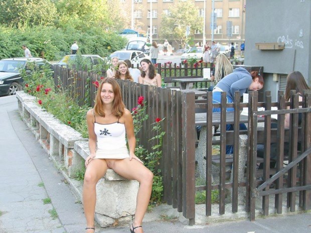 Lovely amateur exhibitionist shows upskirt in public