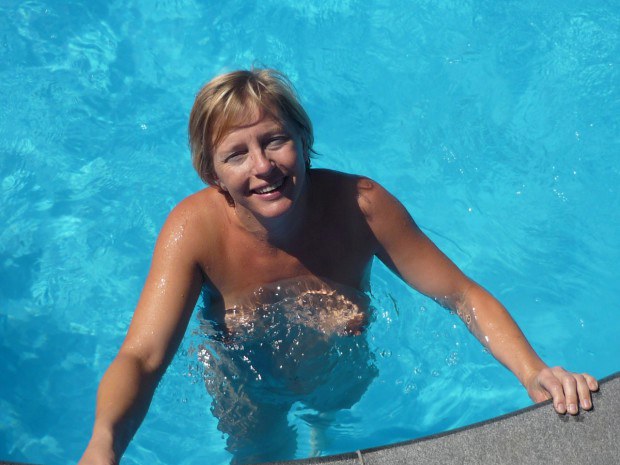 Naked mature wife teasing at the pool