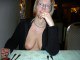 Wife Claudine reveals her big boobs at the restaurant