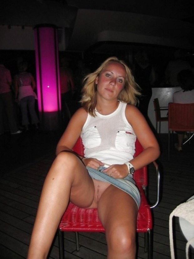 Blonde sweetheart shows upskirt at the restaurant