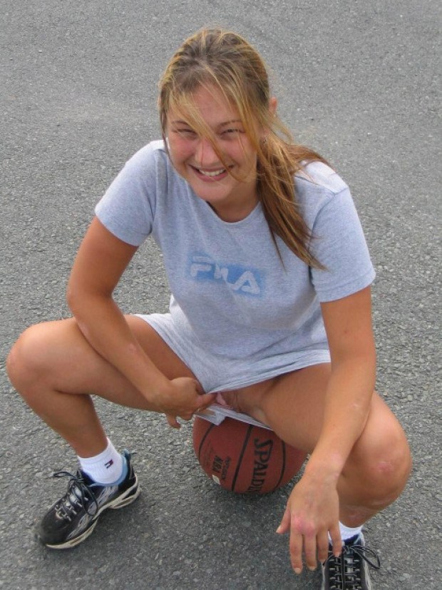 Teen Shows Her Shaved Pussy Through Basketball Shorts