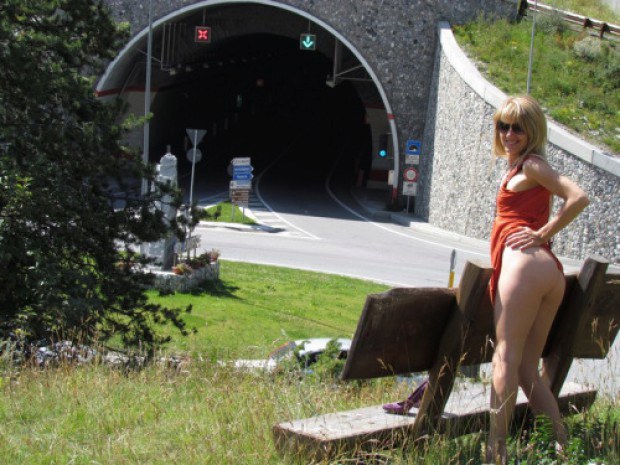 Gorgeous blonde amateur shows her ass next to the tunnel