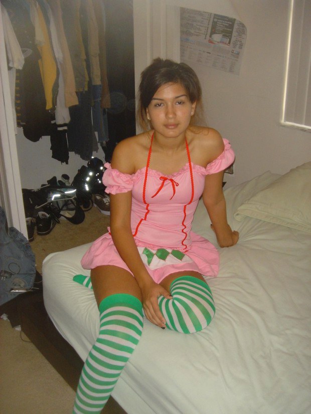Cute teen girlfriend waiting home in her sexy outfit